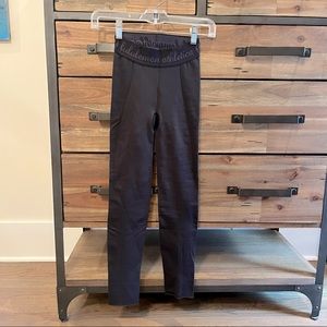 NWOT lululemon black cut out tights. Size small. Excellent condition!!